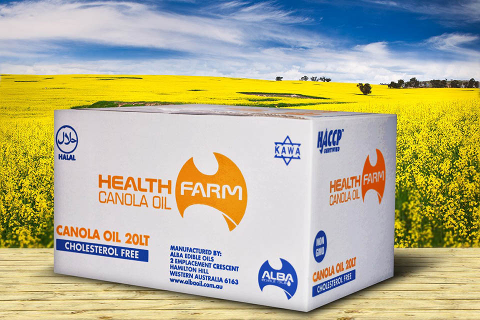 Mock up on large block of butter sitting in a field of yellow blossoming crops