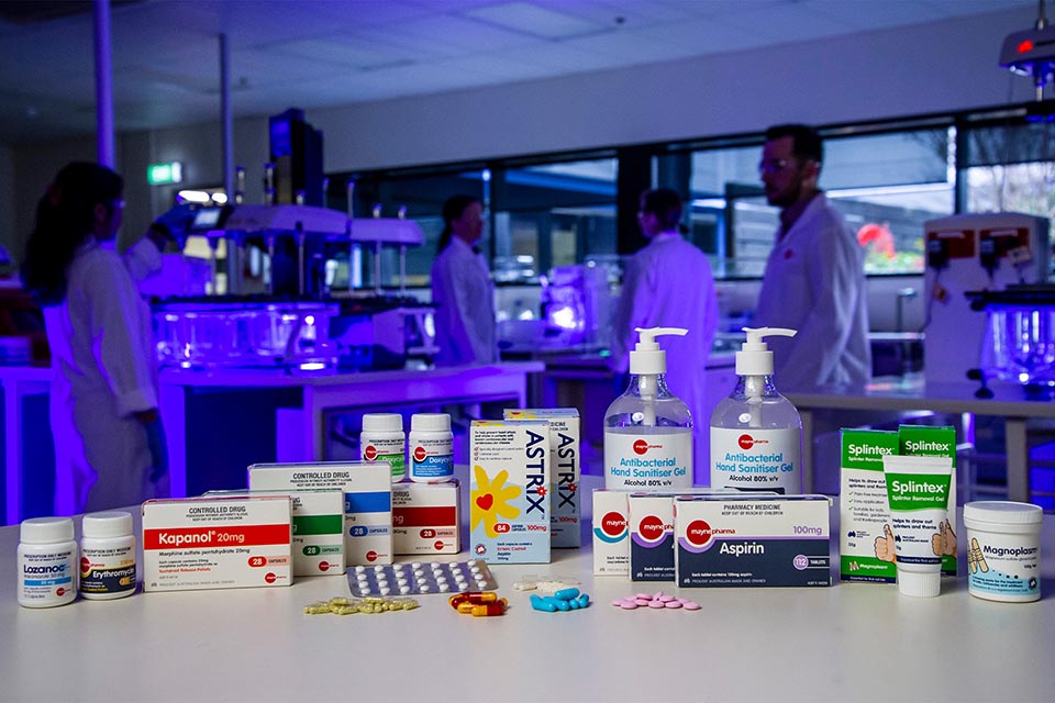 Arrangement of packaged pharaceuticals on a table in a laboratory