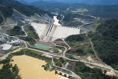 Aerial view of a dam and surrounding roads