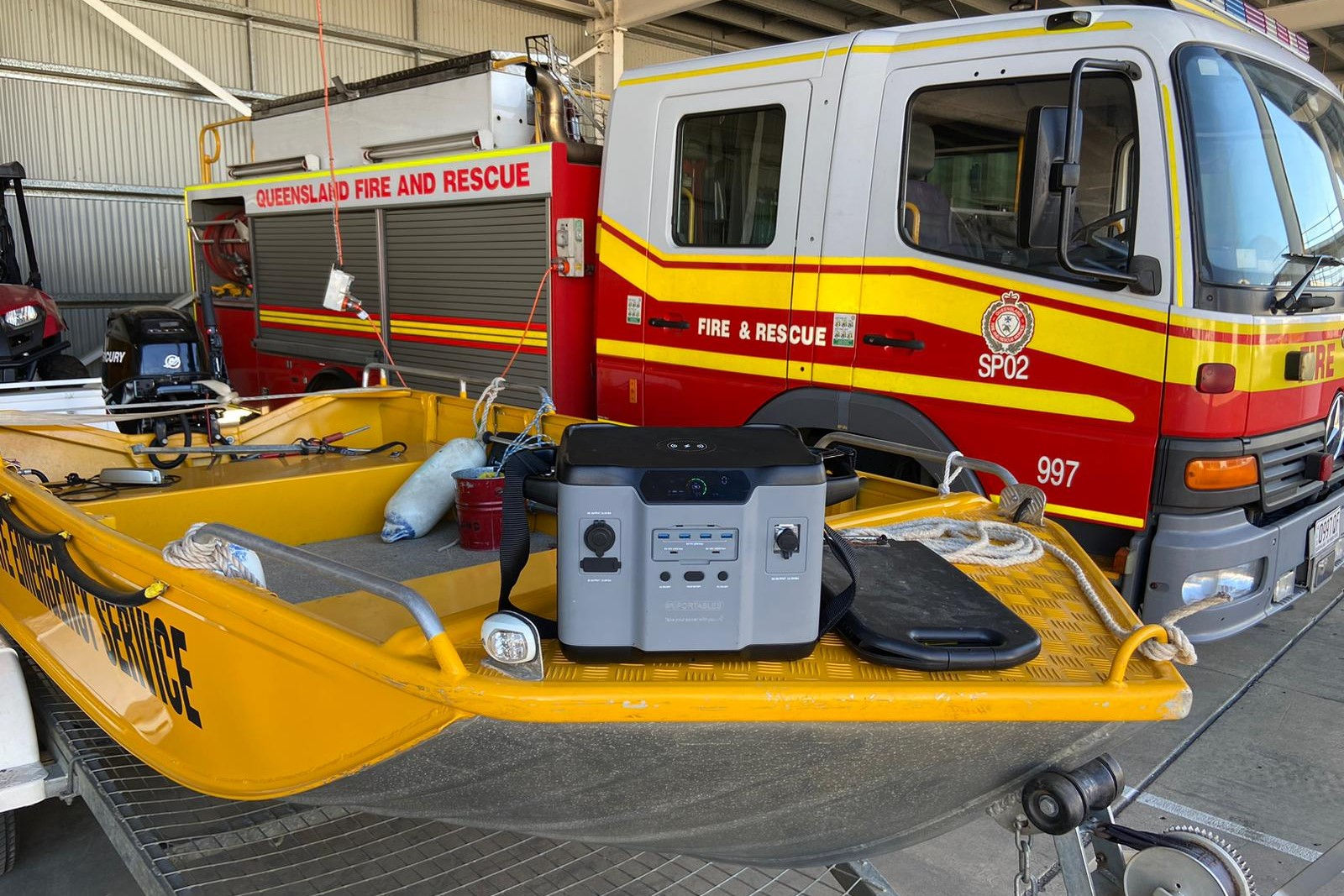 portable-energy-appliance-fire-brigade-truck-in-background