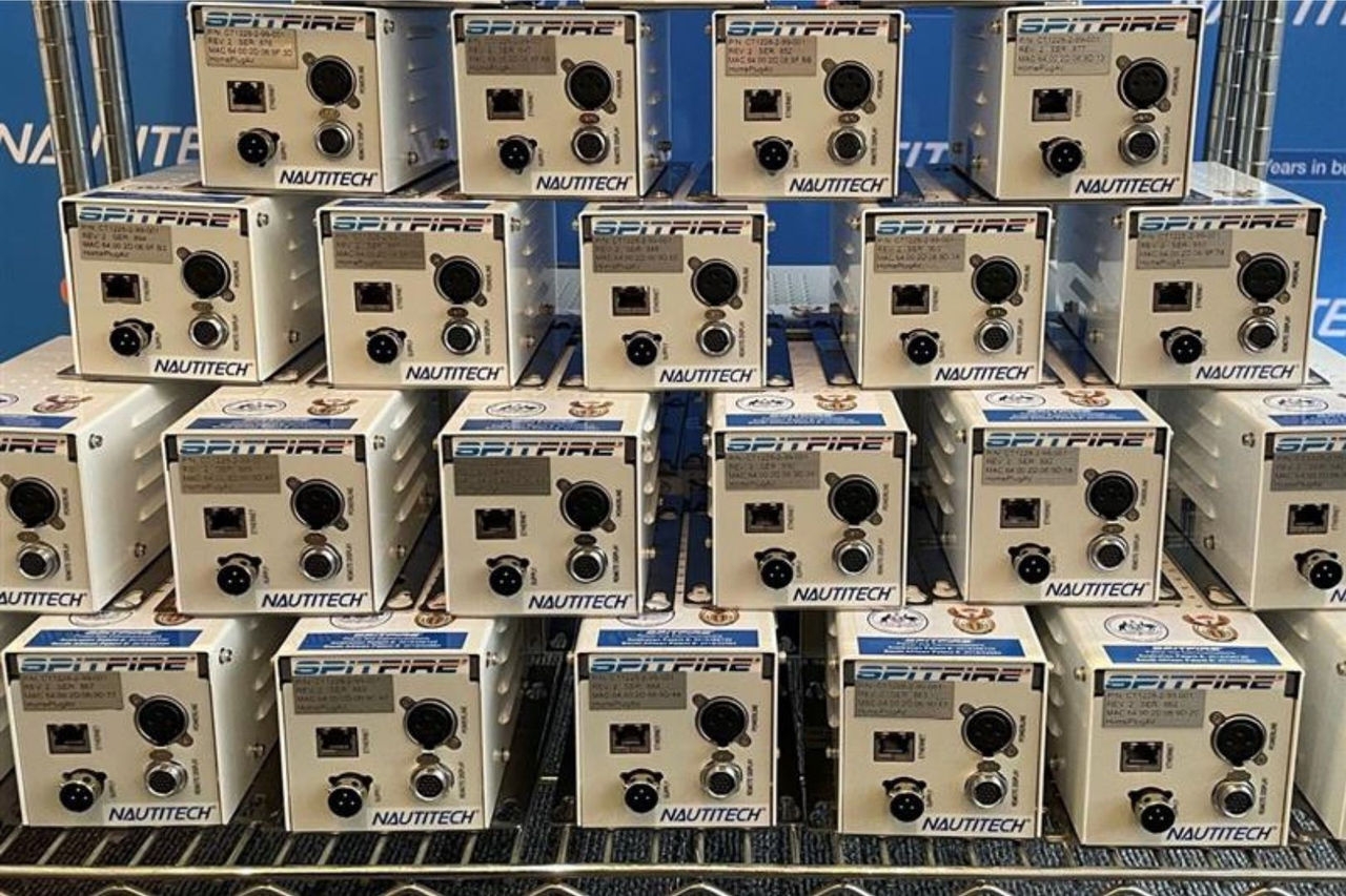 a stack of metal boxes containing switches and plug outlets