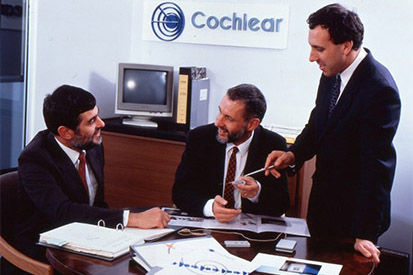 Cochlear executives in a meeting