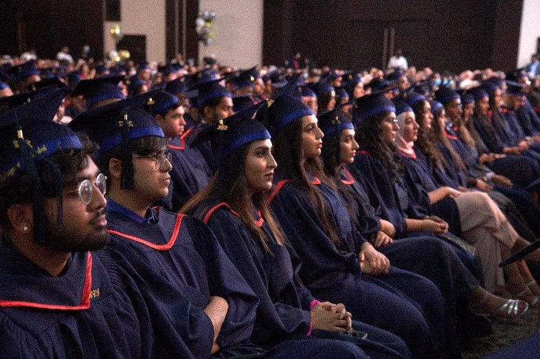 University students graduating